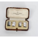 A pair of H G Murphy silver and niello cuff links, rounded rectangular panels alternately