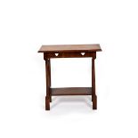 An Arts and Crafts oak occasional table, slender rectangular top, above flaring rectangular legs,