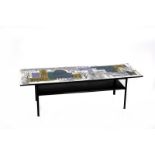 A Myer coffee table designed by John Piper for retail by Heal's, enamelled metal frame with