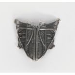 A Secessionist continental silver buckle, cast in low relief with a moth design, with applied loops,