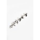 A Georg Jensen silver bracelet designed by Henning Koppel, model no. 68, five links and a clasp