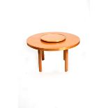 A Finmar laminated birch dining table lazy susan and four chairs designed by Alvar Aalto, retailed