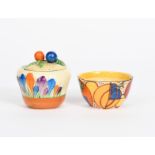 'Melon' a Clarice Cliff Fantasque Bizarre sugar basin, painted in colours, and a Clarice Cliff
