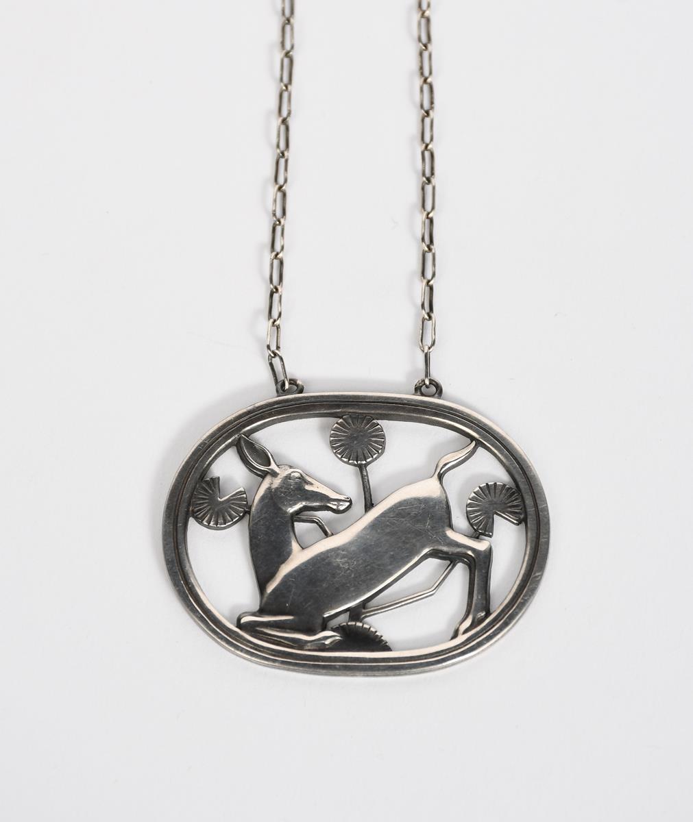 A Georg Jensen silver pendant necklace designed by Arno Malinowski, model no.95, pierced and cast in