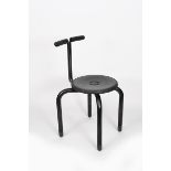 An Archap Moto Magis stool, black enamelled frame with burbber covered seat, back and feet cast Moto