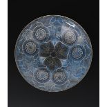 A French opalescent glass bowl in the manner of Marius Sabino, cast in low relief with stylised