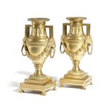 A PAIR OF GEORGE III ORMOLU CANDLESTICKS IN THE MANNER OF MATTHEW BOULTON, C.1770 each in the form