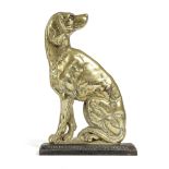 A VICTORIAN BRASS DOG DOORSTOP LATE 19TH CENTURY with an iron base 32.3cm high