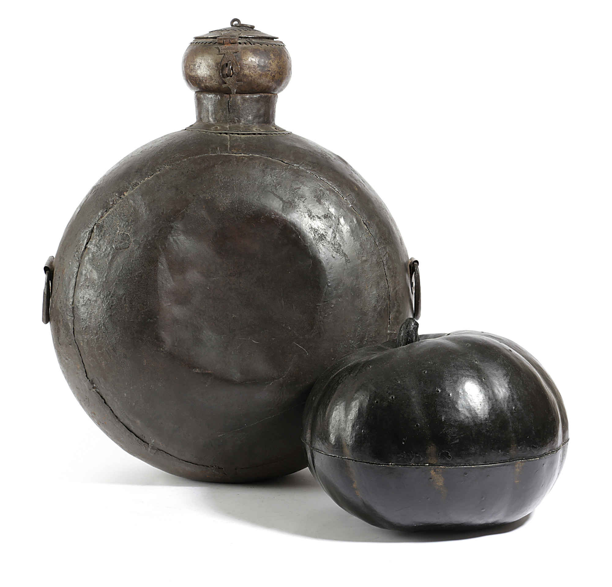 AN ORIENTAL BLACK LACQUERED PUMPKIN BOX 20TH CENTURY together with an Islamic copper flask (2) 57.