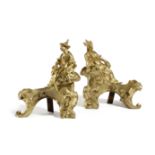 A PAIR OF FRENCH ORMOLU CHENETS POSSIBLY LOUIS XV, C.1760 modelled with chinoiserie figures, on a