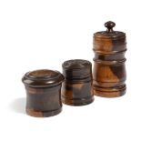 THREE TREEN LIGNUM VITAE POTS 19TH CENTURY with turned, reeded and moulded bands, all with lids, one