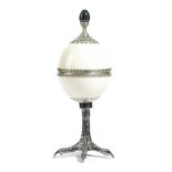 AN OSTRICH EGG AND WHITE METAL CUP AND COVER ATTRIBUTED TO ANTHONY REDMILE, C.1970-80 the lid with a