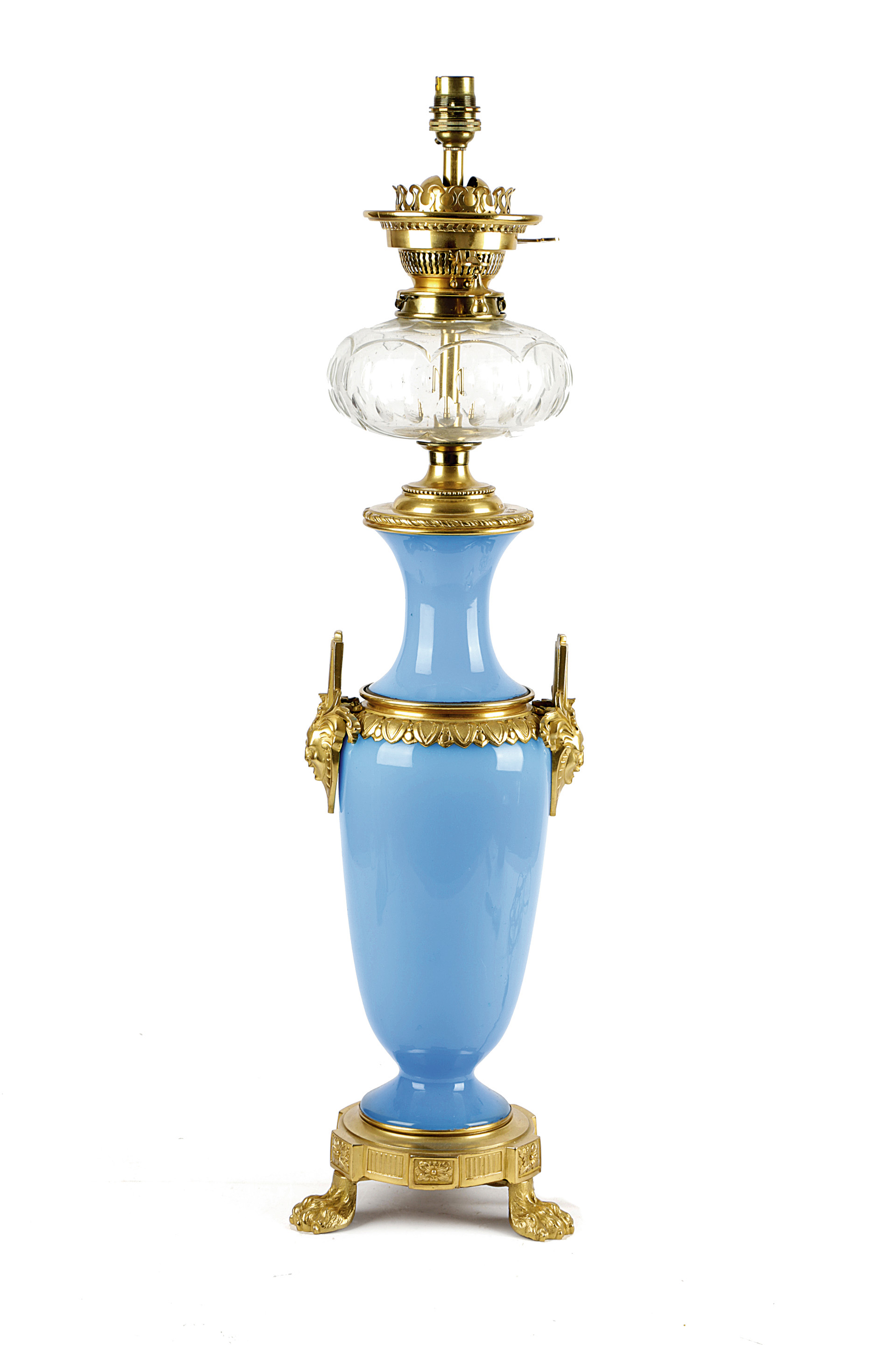 A FRENCH BLUE OPALINE GLASS AND ORMOLU OIL LAMP LATE 19TH CENTURY with a cut-glass reservoir,