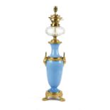 A FRENCH BLUE OPALINE GLASS AND ORMOLU OIL LAMP LATE 19TH CENTURY with a cut-glass reservoir,