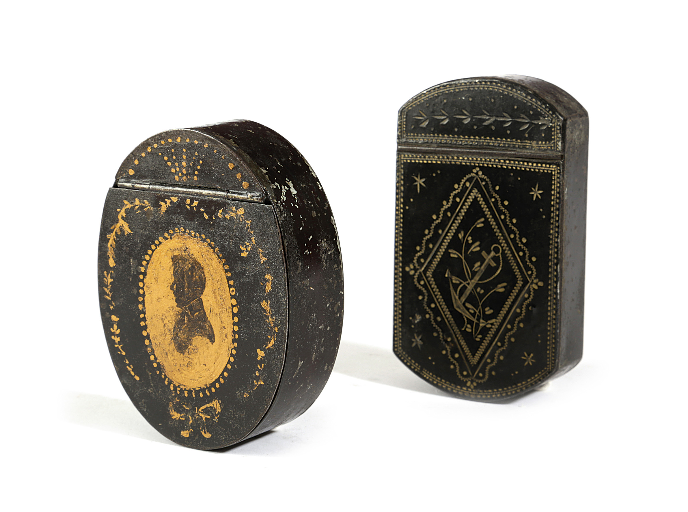 TWO JAPANNED TOLE SNUFF BOXES 19TH CENTURY both with part hinged lids, one of oval form, decorated