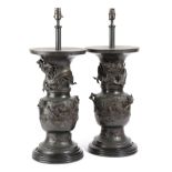 A PAIR OF BRONZE TABLE LAMPS IN JAPANESE STYLE, 20TH CENTURY each decorated with a scaly dragon,