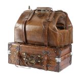 A BROWN LEATHER OVERNIGHT CASE EARLY 20TH CENTURY together with a brown leather Gladstone bag (2)