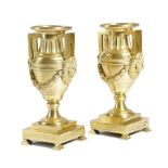 A PAIR OF GEORGE III ORMOLU CANDLESTICKS IN THE MANNER OF MATTHEW BOULTON, C.1770 each in the form