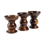 THREE TREEN LIGNUM VITAE POUNCE POTS LATE 18TH / EARLY 19TH CENTURY each with a flared pierced