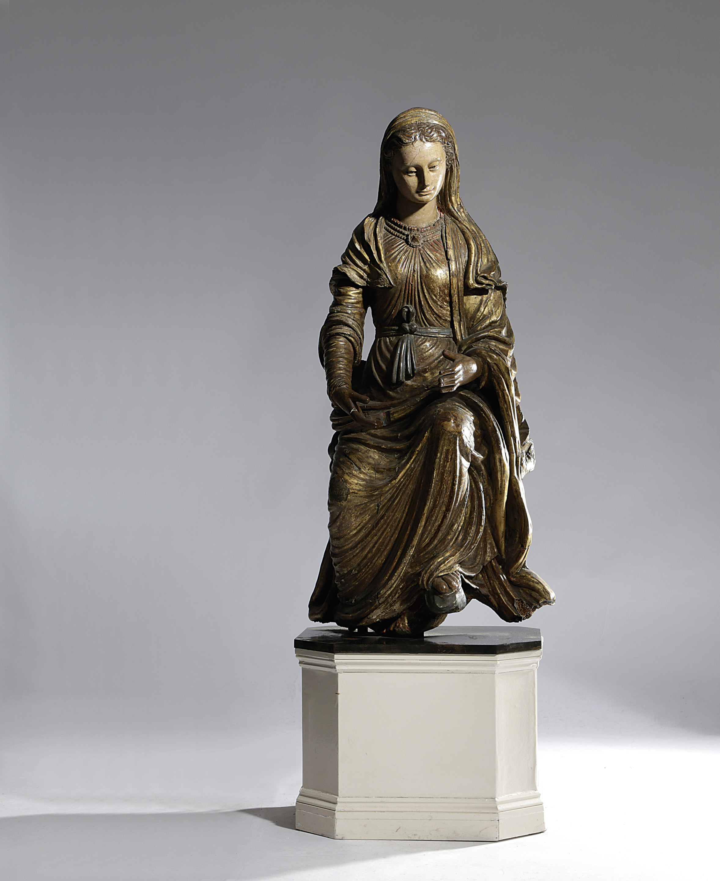 A FRENCH GILTWOOD AND POLYCHROME FIGURE OF THE VIRGIN MARY 16TH / 17TH CENTURY AND LATER mounted