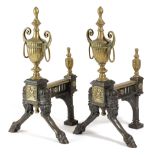 A PAIR OF BRASS AND CAST IRON FIRE DOGS IN GEORGE III STYLE, LATE 19TH CENTURY each with a spiral