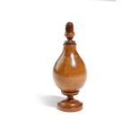 A TREEN BOXWOOD SPICE FLASK 18TH CENTURY in three sections, with an acorn finial, above a globular