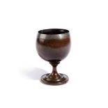 A SILVER MOUNTED TREEN COCONUT CUP LATE 18TH / EARLY 19TH CENTURY unmarked, the rim engraved with