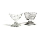 TWO REGENCY CUT-GLASS SALTS EARLY 19TH CENTURY one of navette shape (2) 9.1cm high (max)