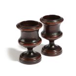 A PAIR OF LATE GEORGE III FRUITWOOD EGG CUPS EARLY 19TH CENTURY of urn shape (2) 8.7cm high