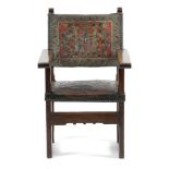 A SPANISH COLONIAL WALNUT AND LEATHER ARMCHAIR IN RENAISSANCE STYLE 18TH CENTURY the back polychrome