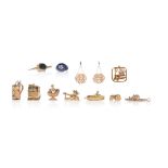 A group of jewels, including; a collection of mid-century hallmarked 9ct gold charms; a man in a top