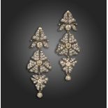 A pair of Russian diamond drop earrings, of stylised foliate design millegrain-set with graduated
