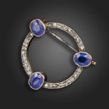 A Russian sapphire and diamond circular brooch, set with rose-cut diamonds and three oval-shaped