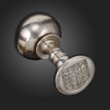 An 18th century silver desk seal, the ball handle over a double spool stem, spreading circular