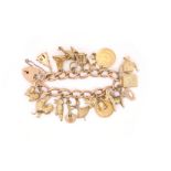 A gold twisted curb-link bracelet, mounted with assorted charms and two half-sovereign pendants, 62g