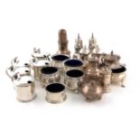 A mixed lot of silver items, various dates and makers, comprising: a set of four mustard pots,