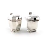 Two French silver Art Deco mustard pots, by A. Aucoc, Paris, upright rectangular panelled form,