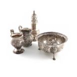 A mixed lot of silver items, various dates and makers, comprising: a late-Victorian sugar bowl, in