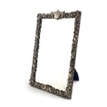 A Victorian silver dressing table mirror, by William Comyns, London 1887, rectangular form,