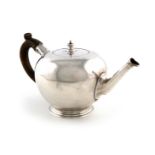 A George II silver bullet teapot, by Francis Spilsbury, London 1731, plain circular form, faceted