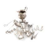 A mixed lot of silver items, comprising: a George III cream jug, London 1762, baluster form,