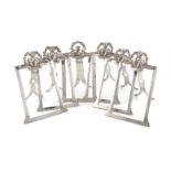 A matched set of six Victorian Regimental silver menu holders, The 8th (King's Royal Irish) Hussars,