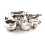 A mixed lot of silver items, various dates and makers, comprising: a two-handled sugar bowl,