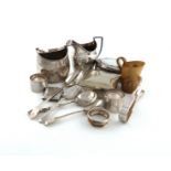 A mixed lot of silver items, various dates and makers, comprising: a George III cream jug, of oval