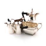 A mixed lot of silver items, various dates and makers, comprising: a hot water pot / coffee jug,