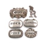 A small collection of six antique silver wine labels, comprising: a George IV one by Reily and