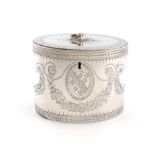 A George III silver tea caddy, by James Young, London 1783, oval form, flush hinged cover with a