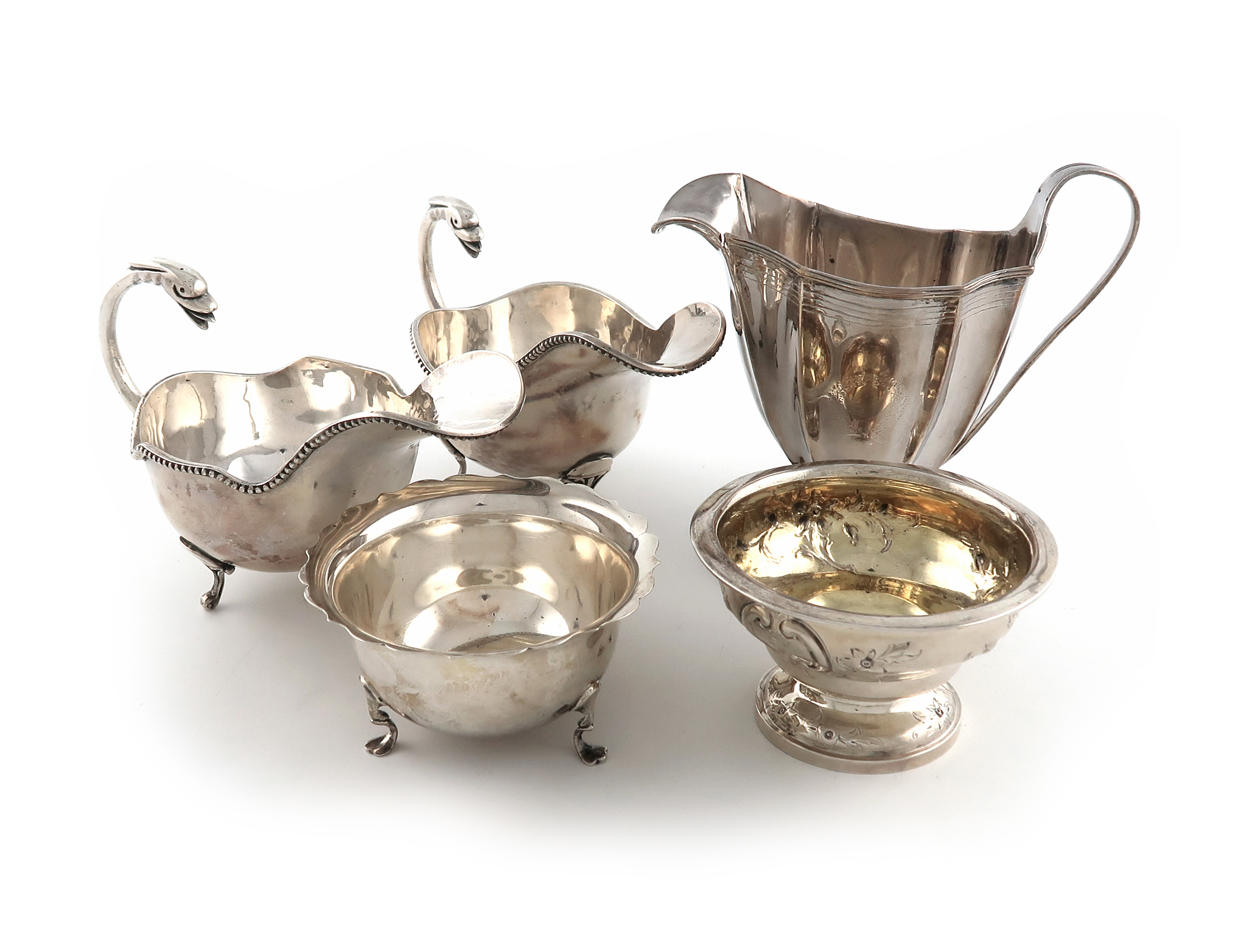 A mixed lot of silver items, various dates and makers, comprising: a George III cream jug, by John