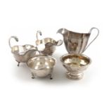 A mixed lot of silver items, various dates and makers, comprising: a George III cream jug, by John