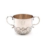 A late 17th century silver two-handled porringer, marks worn, maker's mark ?C with a crown above,